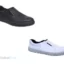 Chaussure de sécurité tige basse sans lacet ALLURE S2, tige en microfibre imperméable, doublure en cuir véritable, première orthopédique doublée en cuir, semelle bi-densité antidérapante, coloris noir ou blanc, idéale pour les environnements professionnels tels que la restauration, le médical, le nettoyage et l’industrie légère.